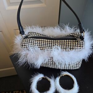 Elegant White and Silver Women's Bag with matching earrings.